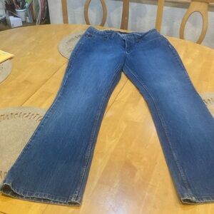 Ladies  glared blue jeansRidets stretch dark blue size 9/10 medium